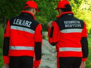 Polar ratowniczy North-Wind FLUO z kompletem emblematów odblaskowych na rzep