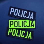 Emblemat dowolny czarny nadruk tło FLUO na COMBAT na rzepie 11 x 4 cm