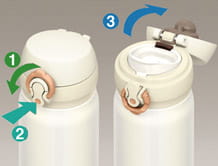 Thermos Motion - uniwersalny termokubek - otwieranie